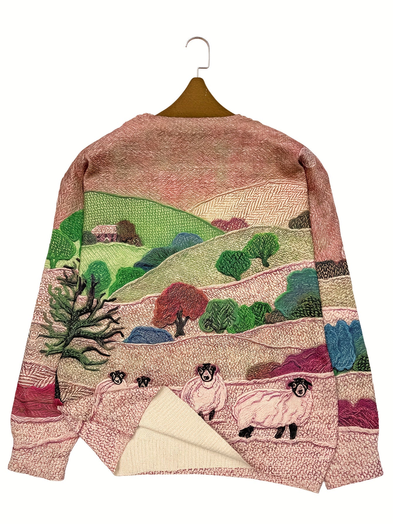 Textile art piece with landscape design on a hanger