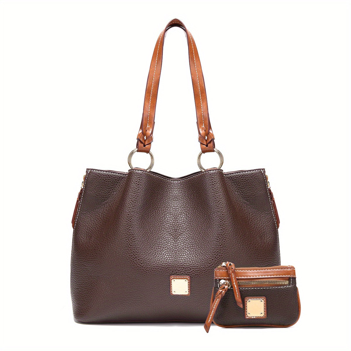 Brown leather handbag with matching wallet on a white background