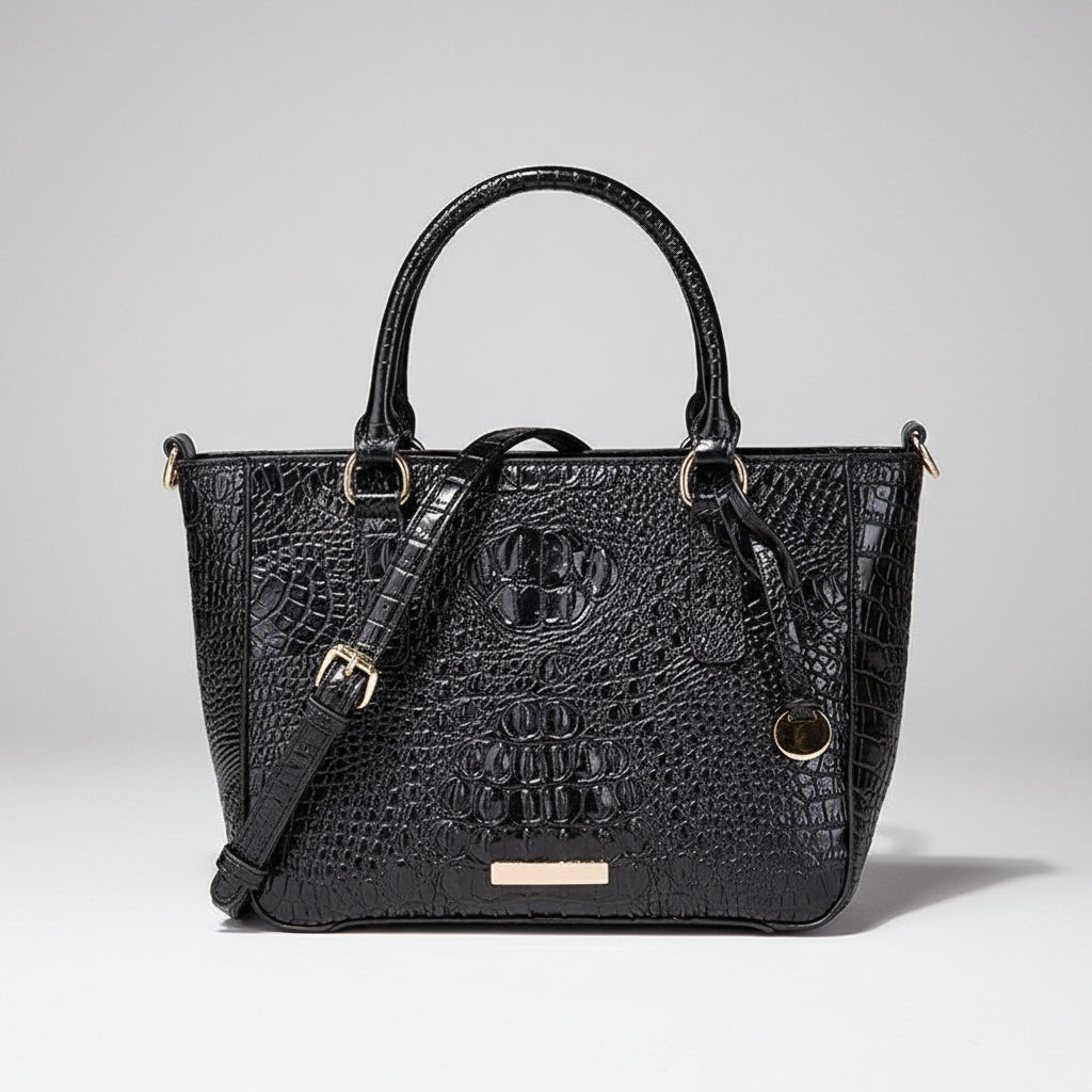 Black textured handbag on a dark background