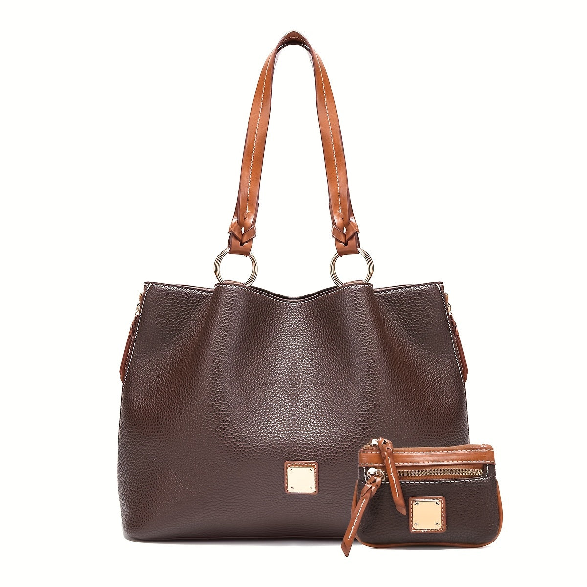 Brown leather handbag with matching pouch on a white background