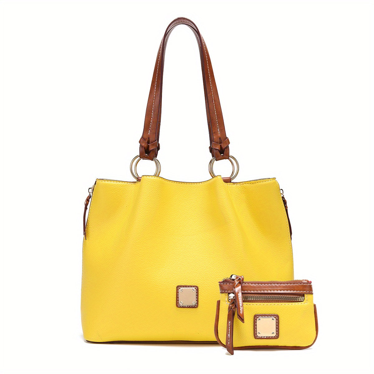 Yellow handbag with brown leather handle and accents on a white background