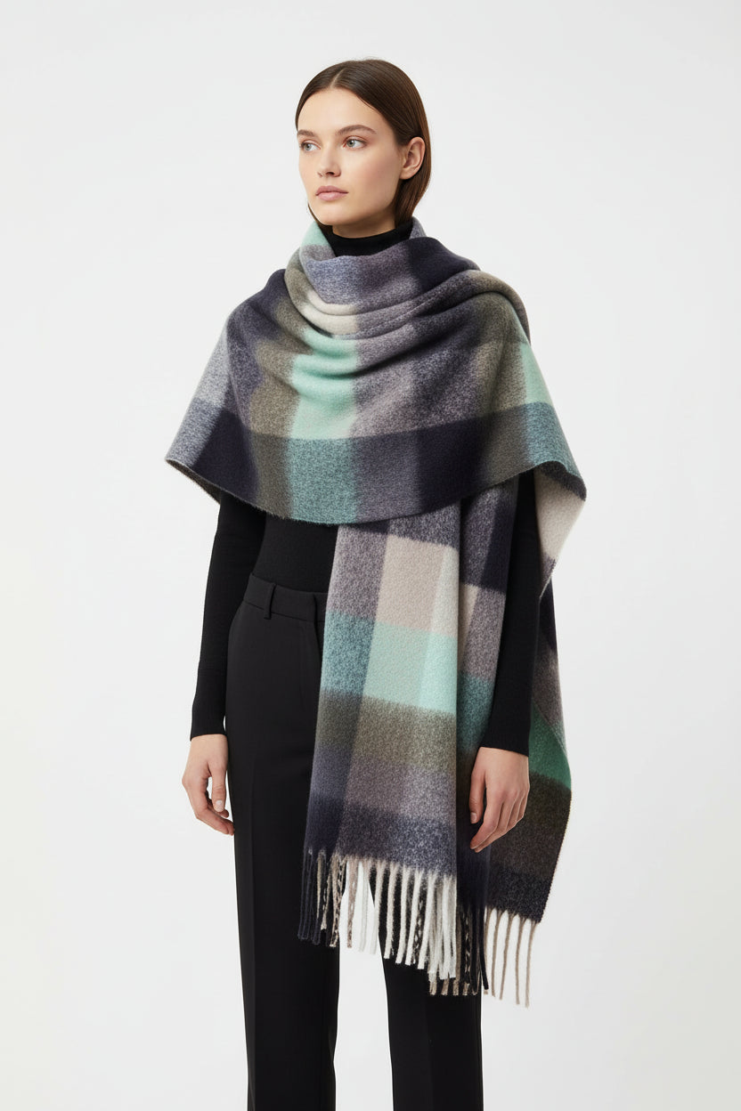Plaid scarf with fringe on a white background