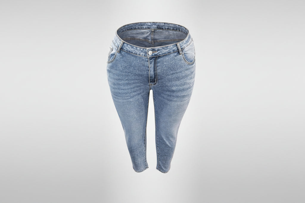 Light blue denim jeans on a white background
