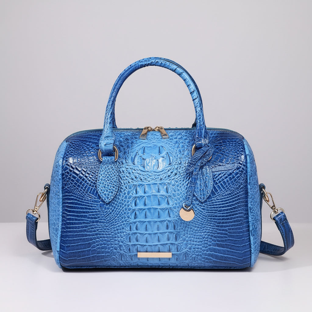 Blue textured handbag on a dark background