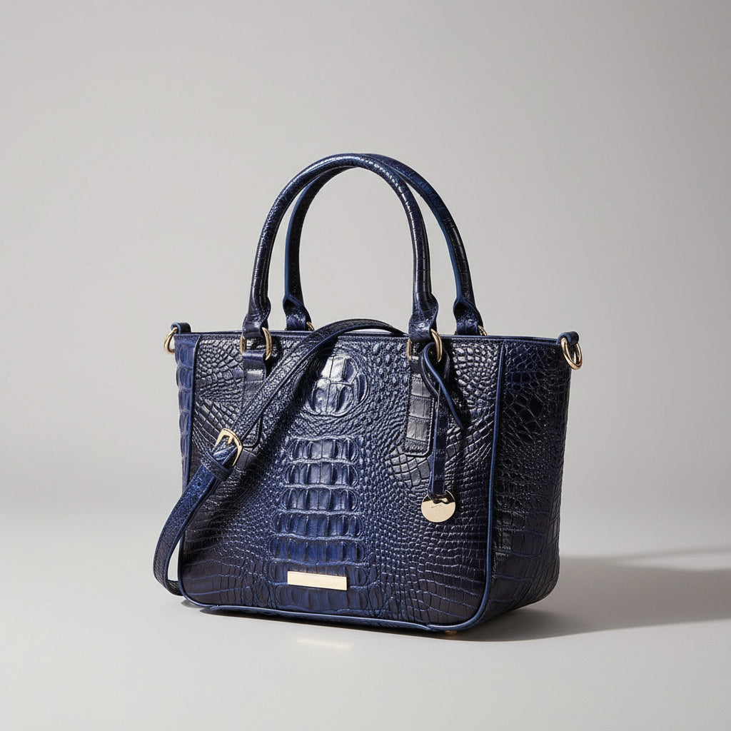 Blue textured handbag on a dark background with wooden elements.