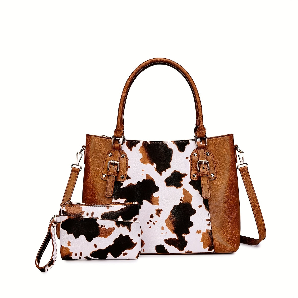 Brown and white cow print handbag with matching wallet on a white background