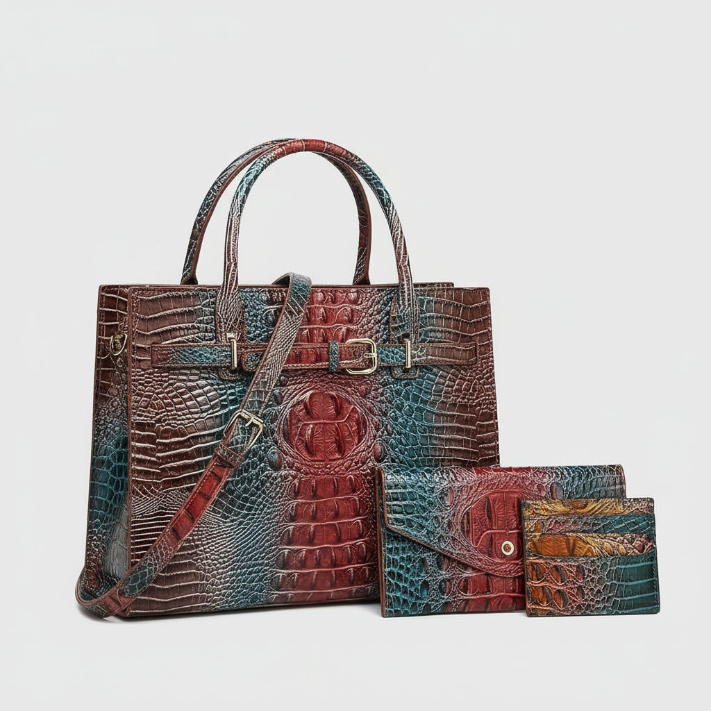 Multicolored crocodile-patterned handbag with matching wallet and cardholder on a white background