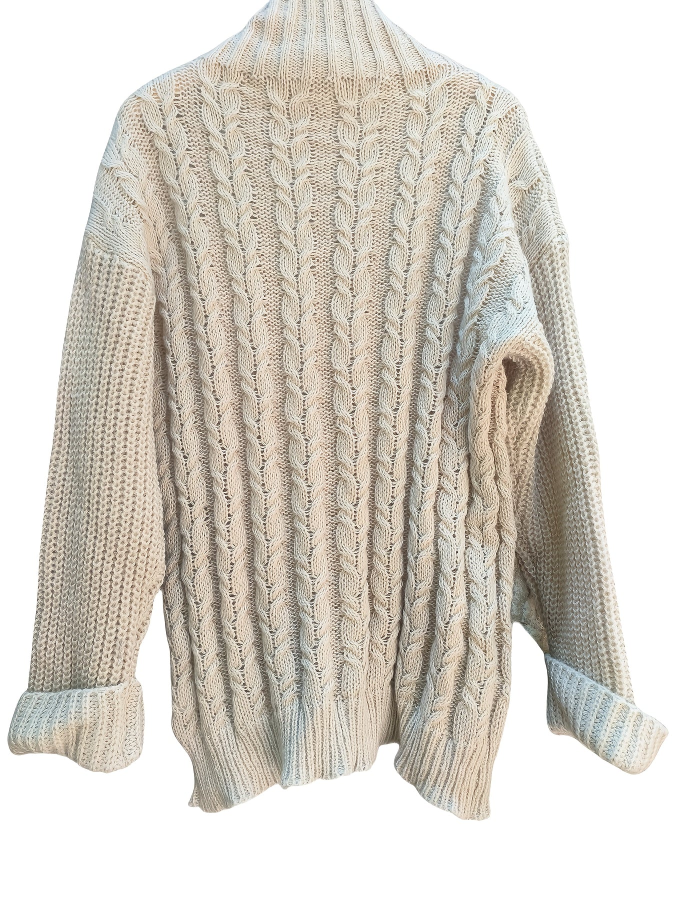 Knitted cardigan with cable pattern on a white background
