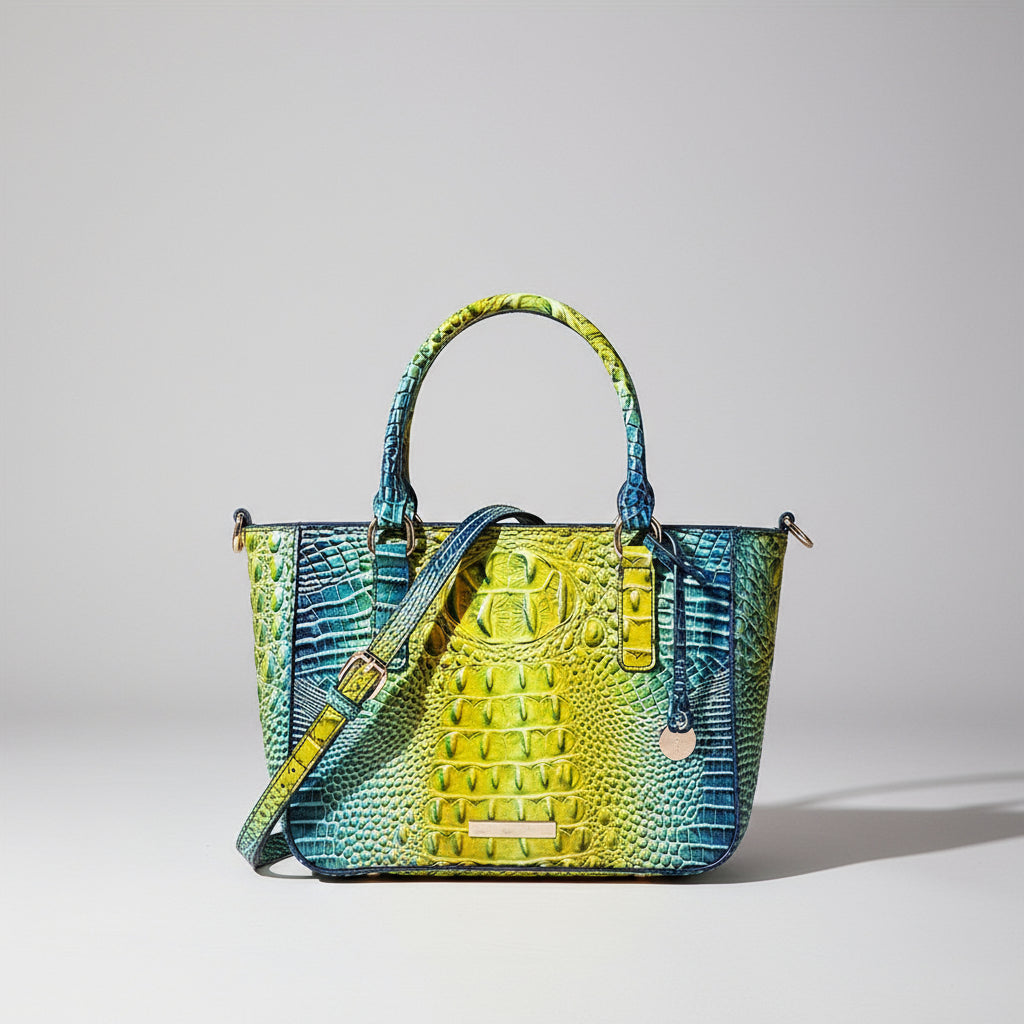 Green and blue textured handbag on a neutral background