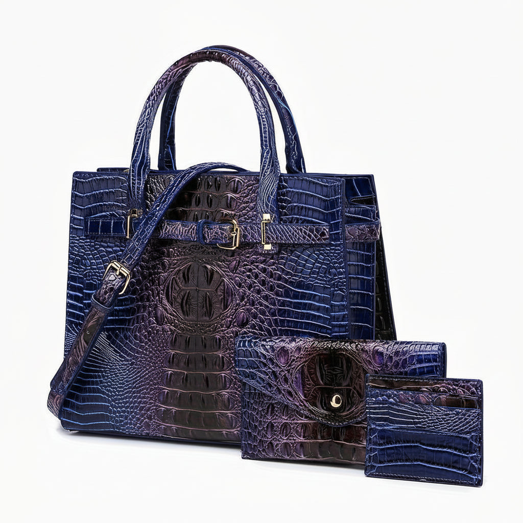 Blue crocodile-patterned handbag with matching wallet on a white background